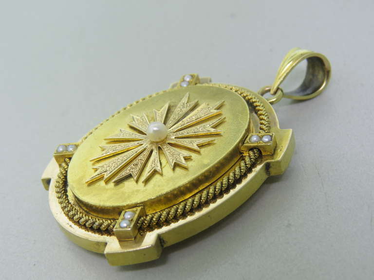 Antique 1880s 14k gold locket with pearls. Locket measures 41mm x 32mm without bale. weight - 22.6g