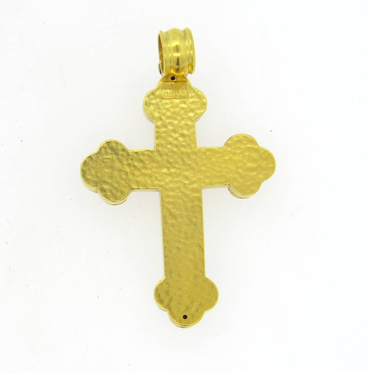 18k gold large cross pendant, crafted by Greek designed Ilias Lalaounis, featuring emerald cabochons and green enamel. Pendant measures 62mm long with bale x 38mm wide. Marked with makers mark,750, Greece. Weight of the piece - 20.3 grams
