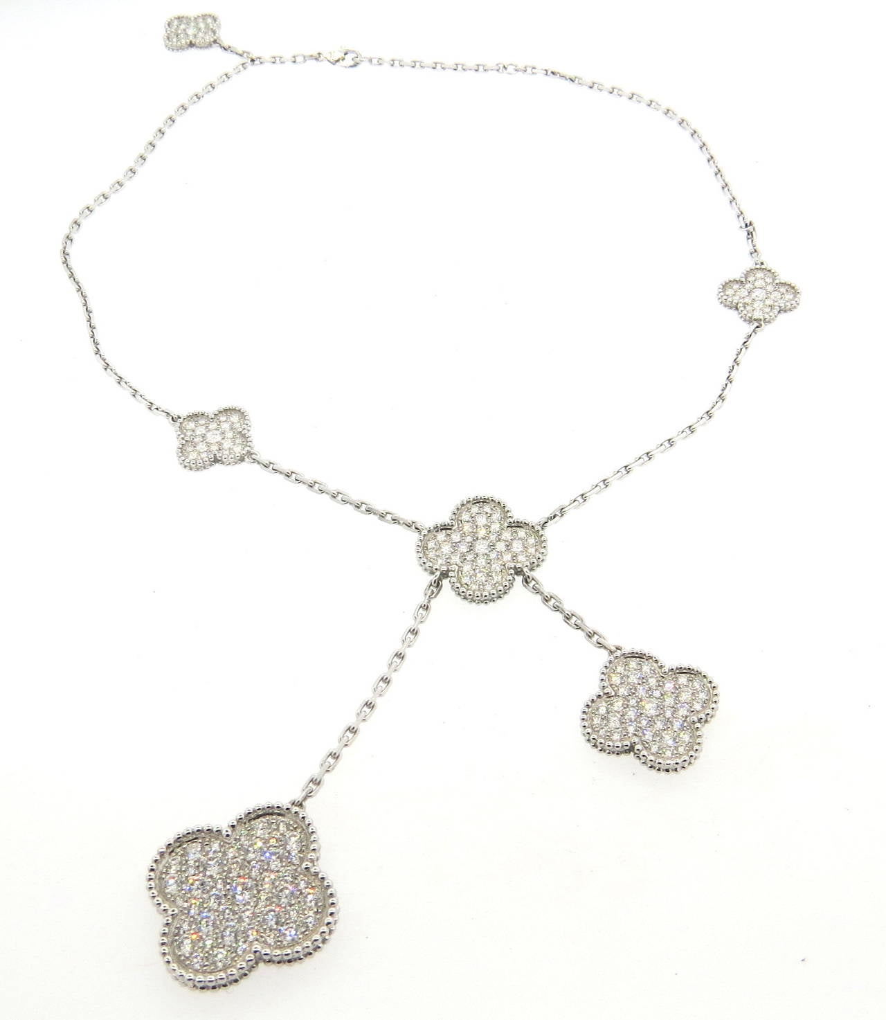 An 18k white gold necklace set with 6.17 carats of DEF / IF-VVS.  Crafted by Van Cleef & Arpels, the necklace measures 16.55