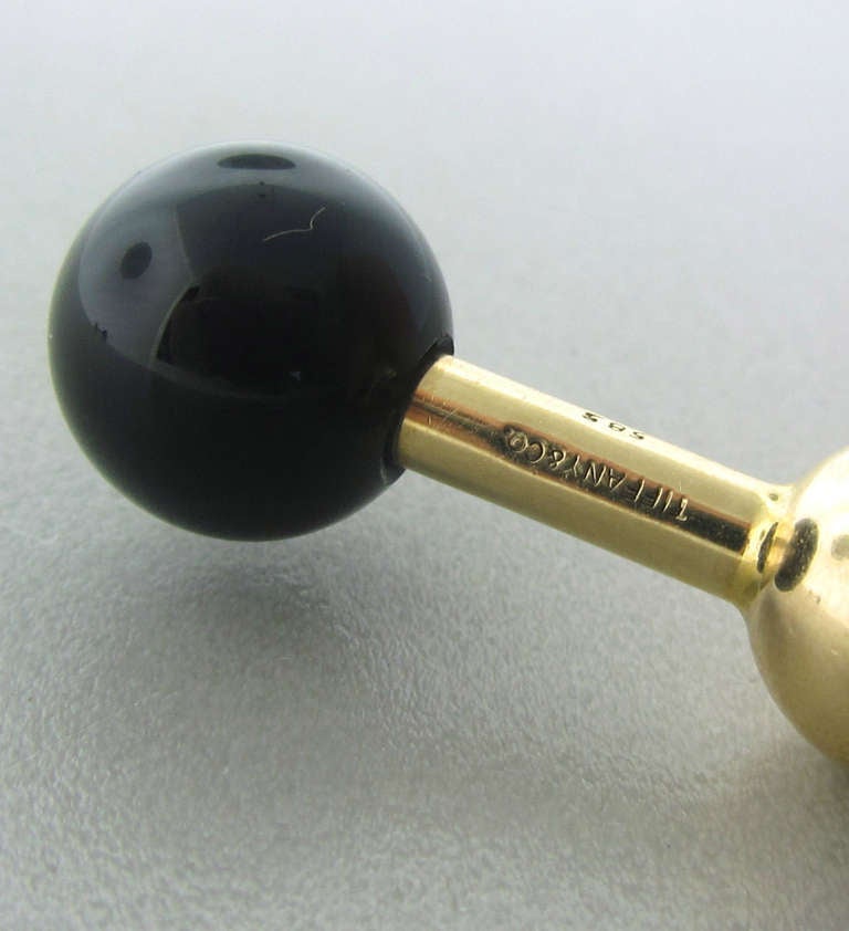 Vintage 14k gold cufflinks by Tiffany & Co,featuring onyx balls. Cufflink Top (Onyx) Is 11mm In Diameter, Smaller End (Gold Ball) Is 9.4mm In Diameter . Weight - 7.5g.