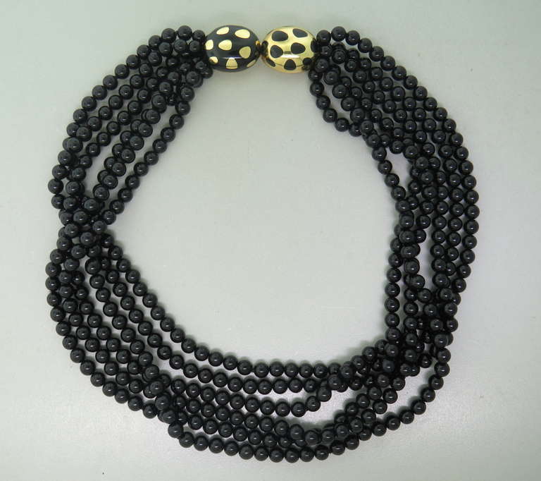 18k gold multi strand black bead necklace by Tiffany & Co. Necklace is 17 3/4