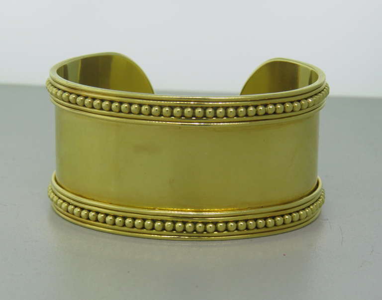 18k gold wide cuff bracelet by Temple St. Clair,currently retails for $15000. Cuff will comfortably fit up to 6 1/2