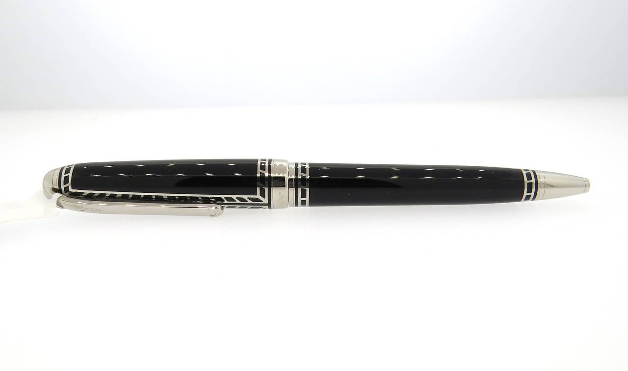 Stunning Cartier limited edition ball point pen featuring a railroad design on black lacquer. Pen is a brand new in store sample, comes with original box and papers. Measures 140mm long. Pen is marked Cartier, 0603/1847. Retails for $1560.