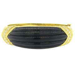 1970s Carved Onyx Diamond Gold Bangle Bracelet