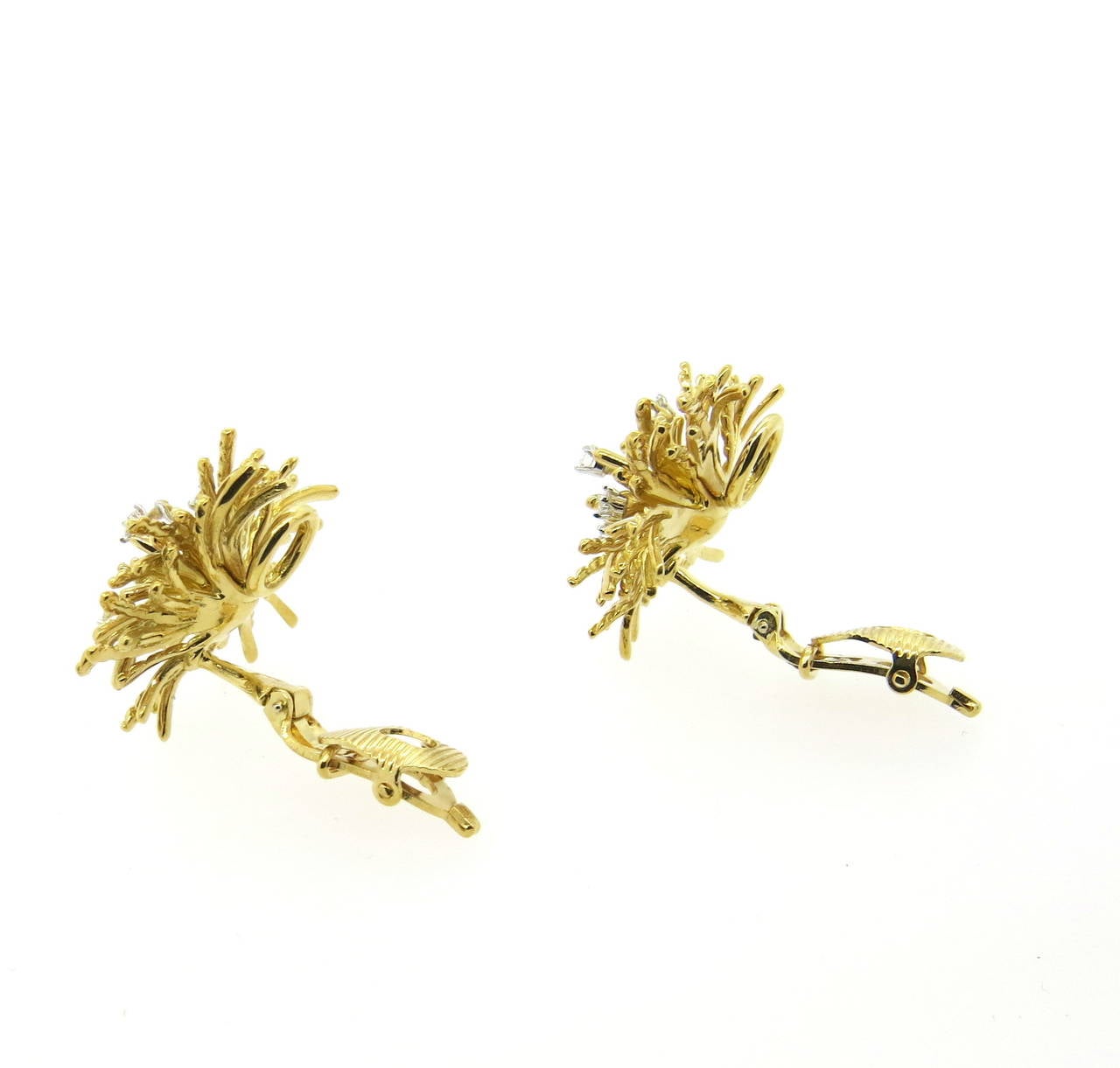 A pair of 18k yellow gold earrings depicting anemone, set with approximately 0.50ctw of G/VS diamonds.  Crafted by Tiffany & Co, the earrings measure 27mm x 26mm and weigh 20.4 grams.