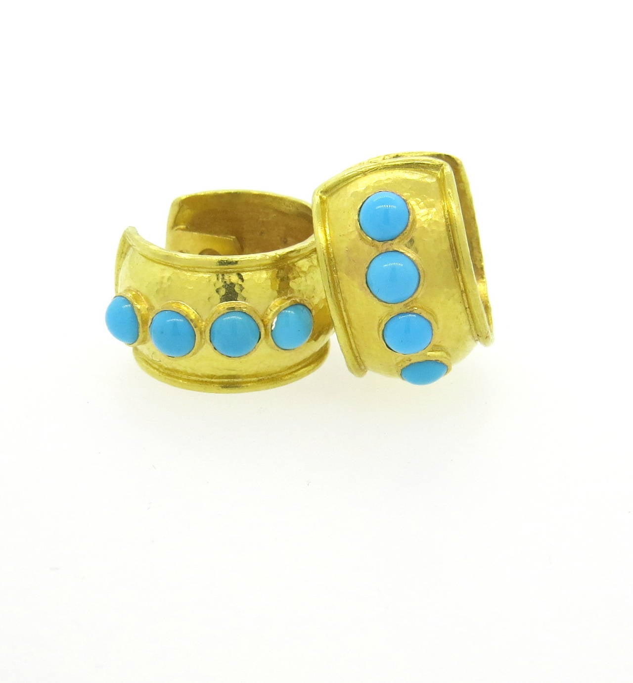 A pair of 19k yellow gold earrings set with turquoise cabochons.  Crafted by Elizabeth Locke as part of her Amalfi collection, the earrings measure 19mm x 12mm and weigh 15 grams.  They currently retail for $4695.