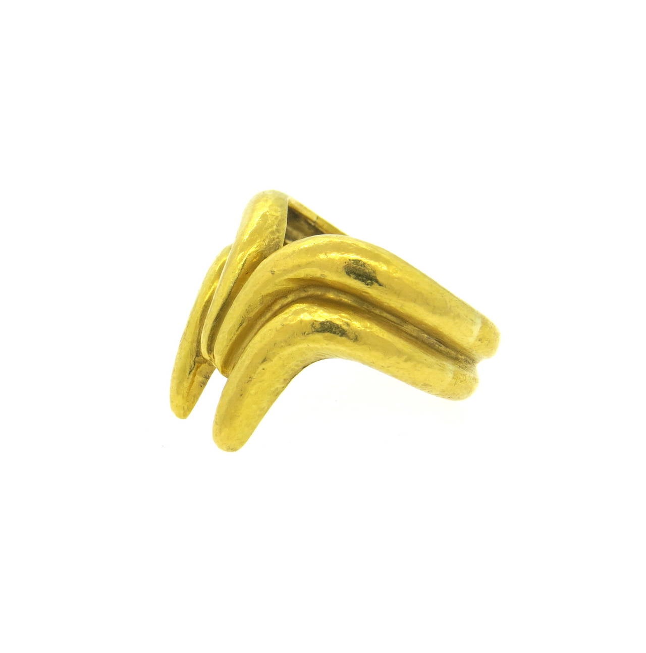 Unusual 22K gold ring by Zolotas. Ring size 6, measures 18mm at widest point. marked Zolota, 22K. Ring weighs 13.7 grams.