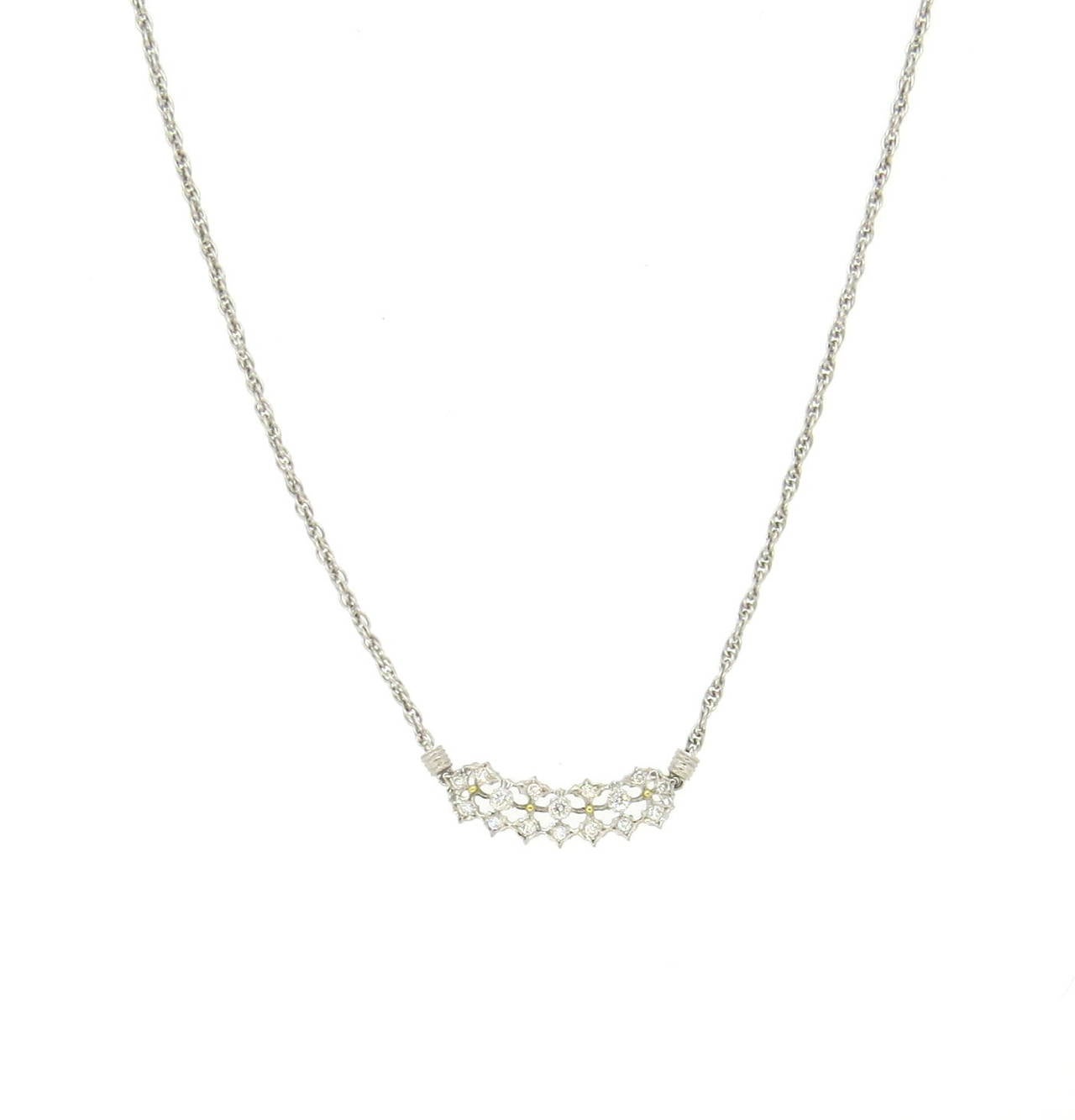 An 18k white gold pendant necklace set with 0.48ctw of G/VS diamonds.  Crafted by Mario Buccellati the necklace measures 16.5