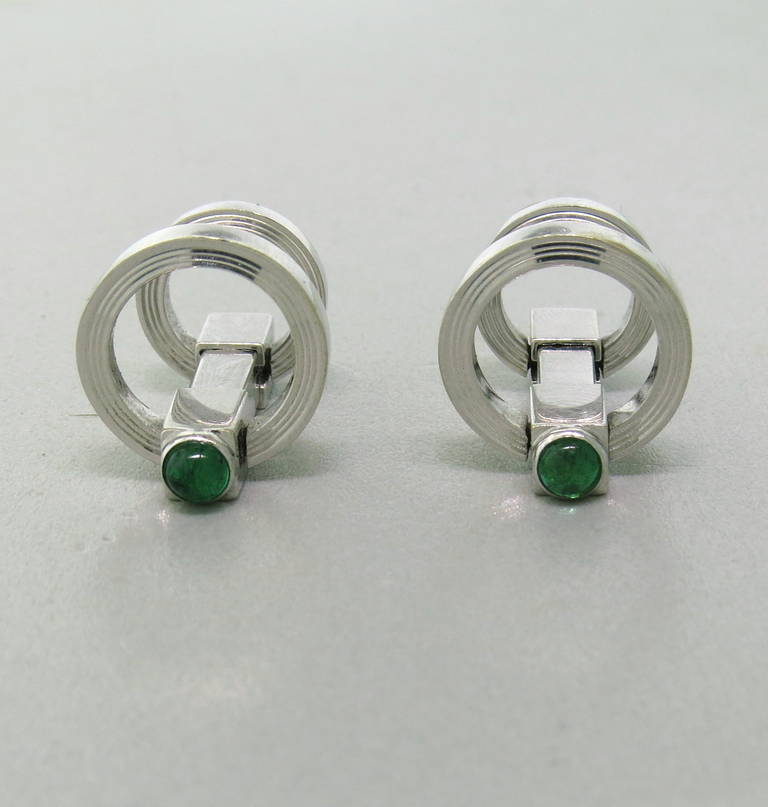 Retro 18k white gold cufflinks with emerald cabochons. Cufflink is 37mm long, smaller ring is 12mm in diameter, larger ring - 15mm in diameter. weight - 16.2 gr