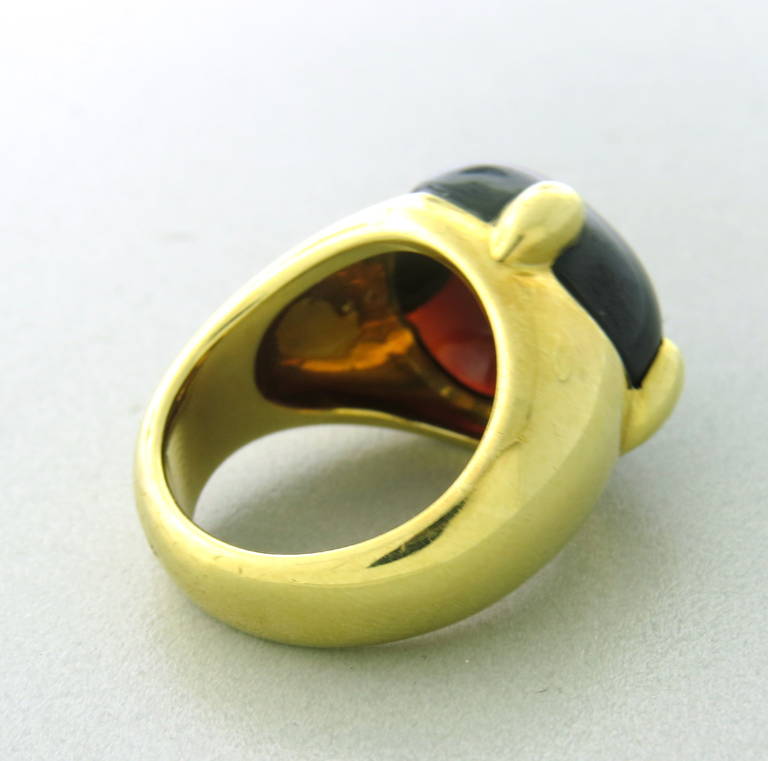 Pomellato 18k gold ring,featuring heart shape garnet cabochon. Ring size 7, ring top is 16mm x 20mm. Marked Pomellato,750. weight of the ring - 20.9 gr