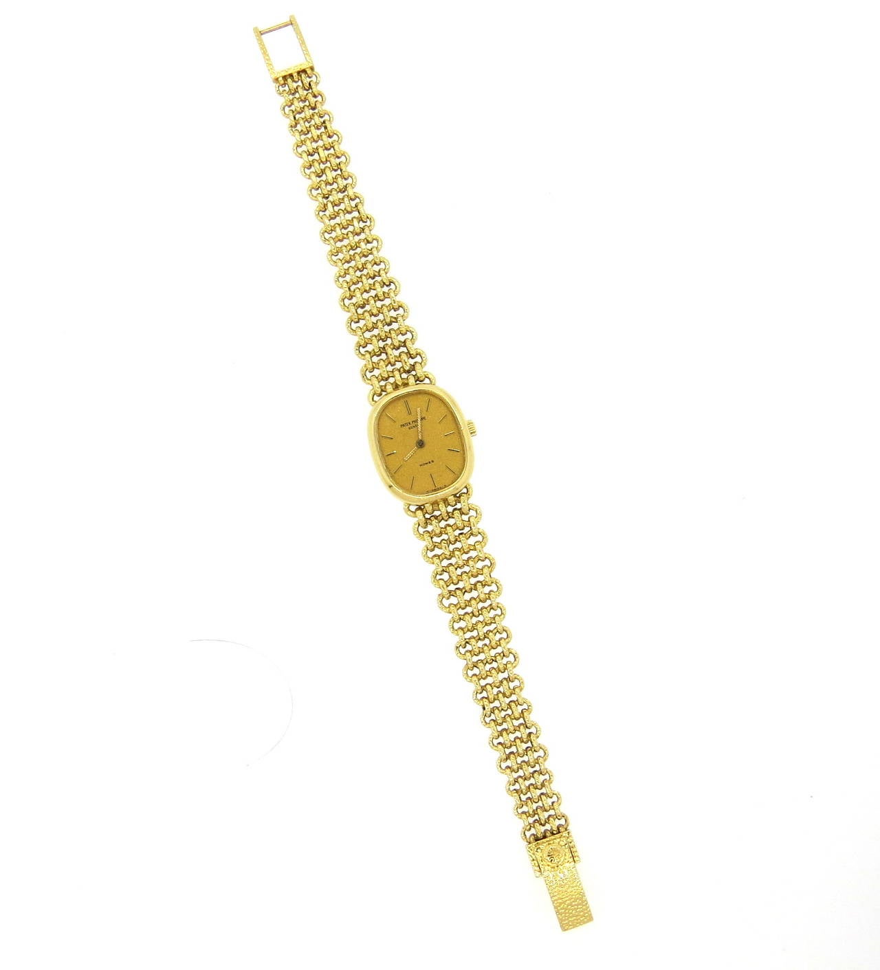 Patek Philippe Lady's Gold Bracelet Wristwatch Ref 4464 In Excellent Condition In Lambertville, NJ
