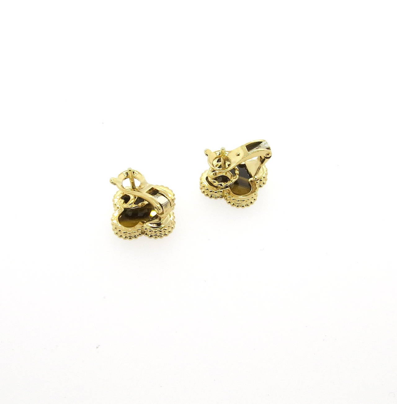 18k gold clover earrings, crafted by Van Cleef  & Arpels for iconic Vintage Alhambra collection, set with tiger's eye. Earrings measure 15mm x 15mm. Marked VCA, Au750, JB316722. Weight - 7.3 grams
Retail for $4850