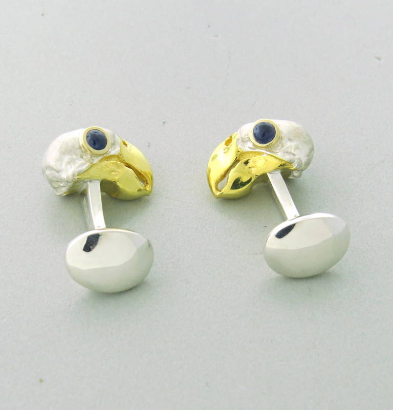 Brand new Deakin & Francis sterling silver sapphire eye bird cufflinks. Come with original box and papers. Cufflinks measure 20mm x 15mm, weight - 29.7gr