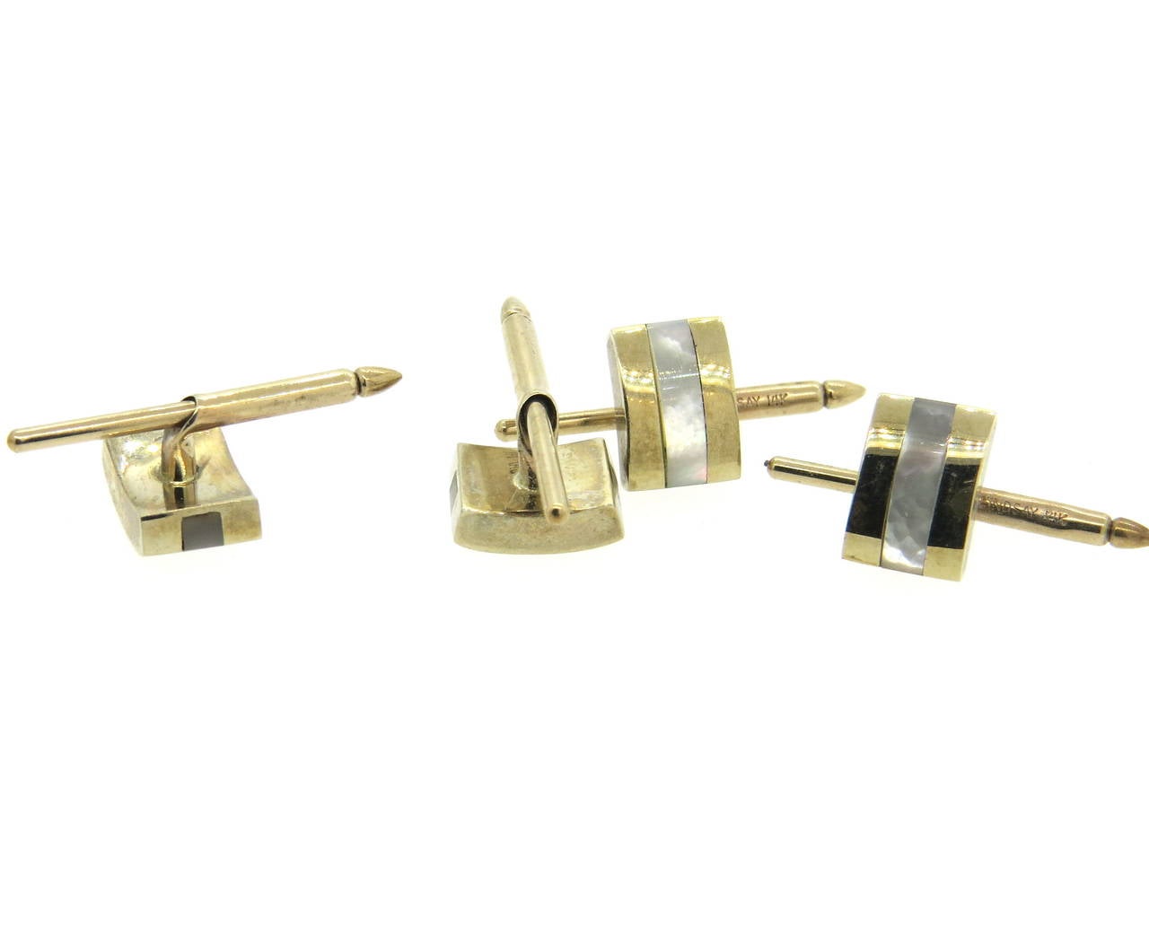 Set of four 14k gold dress studs, crafted by Lindsay & Co, set with mother of pearl inlay. each stud top measures 11.2mm x 8mm.  Marked Lindsay and 14k. Weight of the set - 14 grams