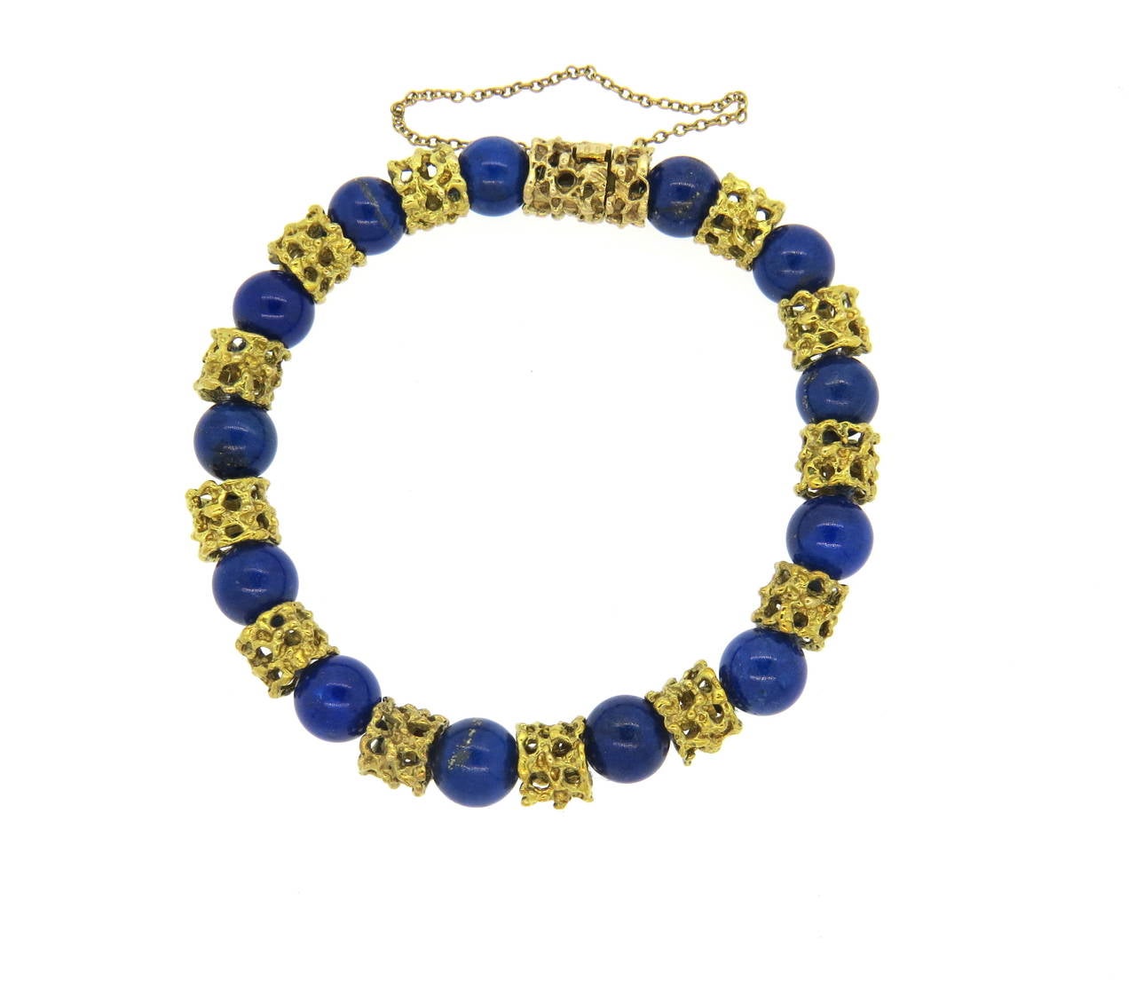 Vintage  1960s 18k gold bracelet, set with 9mm lapis lazuli balls. Bracelet is 8 1/8