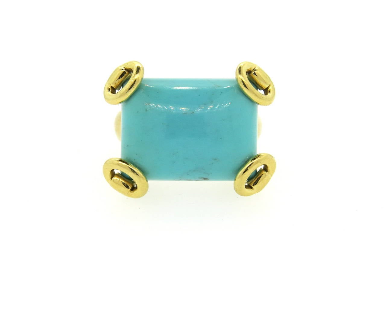 Modern 18k gold ring, crafted by Gucci, set with 15mm x 20mm x 11mm turquoise. Ring is a size 6 1/2, ring top is 20mm x 26mm, ring top sits approximately 15mm from the finger. Marked Gucci,made in Italy, 750,14. Weight of the piece - 24.6 grams.