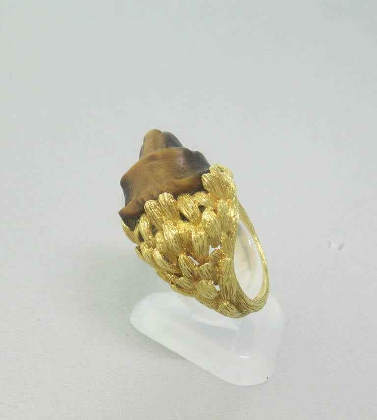 1960s Continental Carved Tigers Eye Bear Gold Ring.  The ring is a size 5 and weighs 11.9 grams.  The ring measures 16mm at the widest point and sits 11mm from finger.
