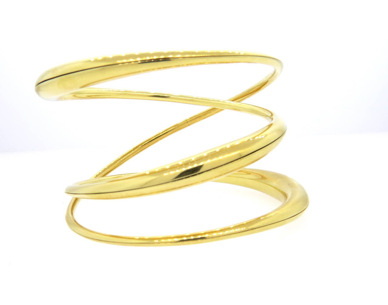 Wide 18k gold twist bangle bracelet, crafted by Michael Good. Bracelet will fit up to 7