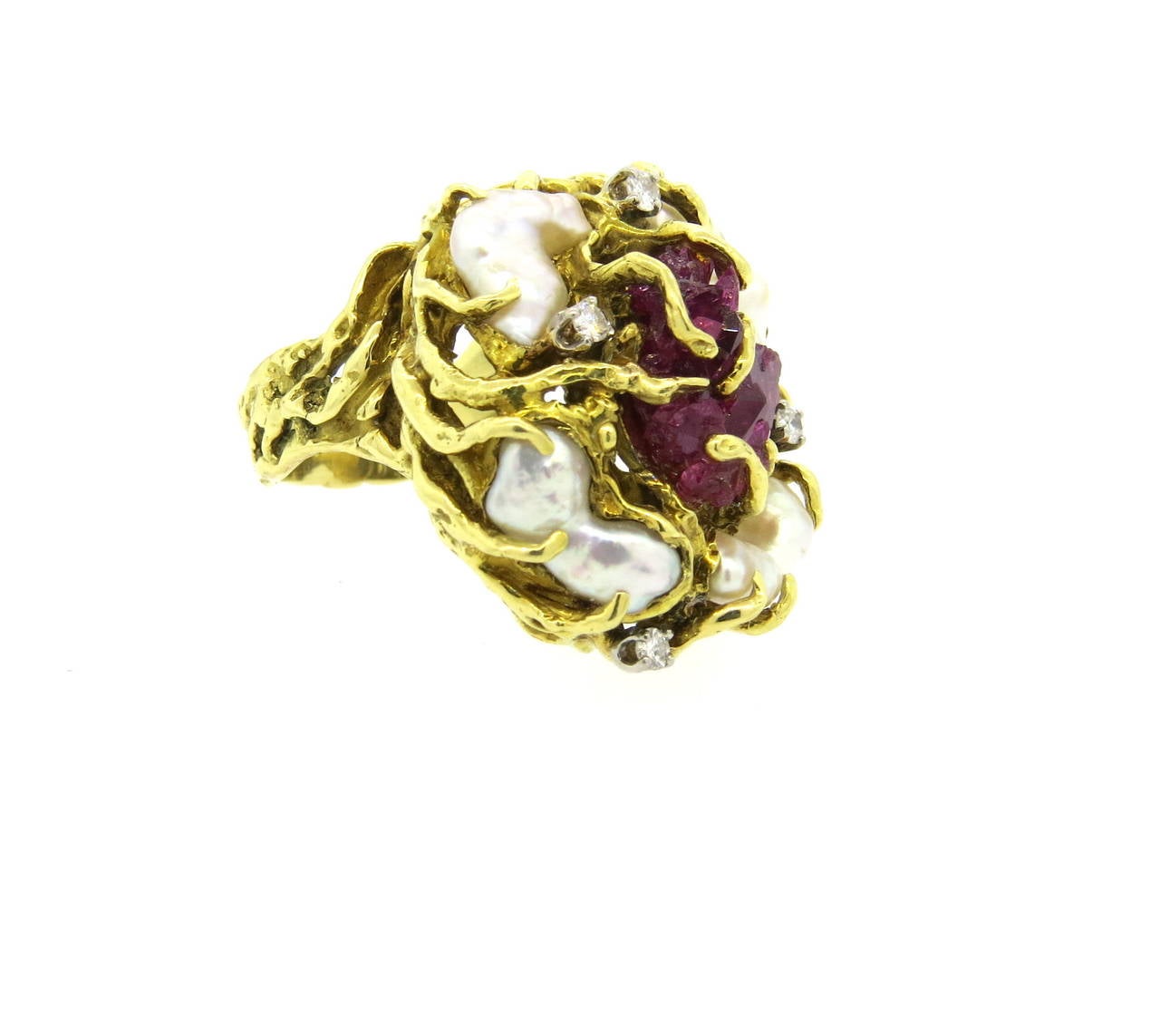 1970s 18k yellow gold free form ring, decorated with chatham ruby, pearls and diamonds. Ring is a size 7 1/4, ring top is 31mm x 27mm. Weight of the piece - 28.9 grams