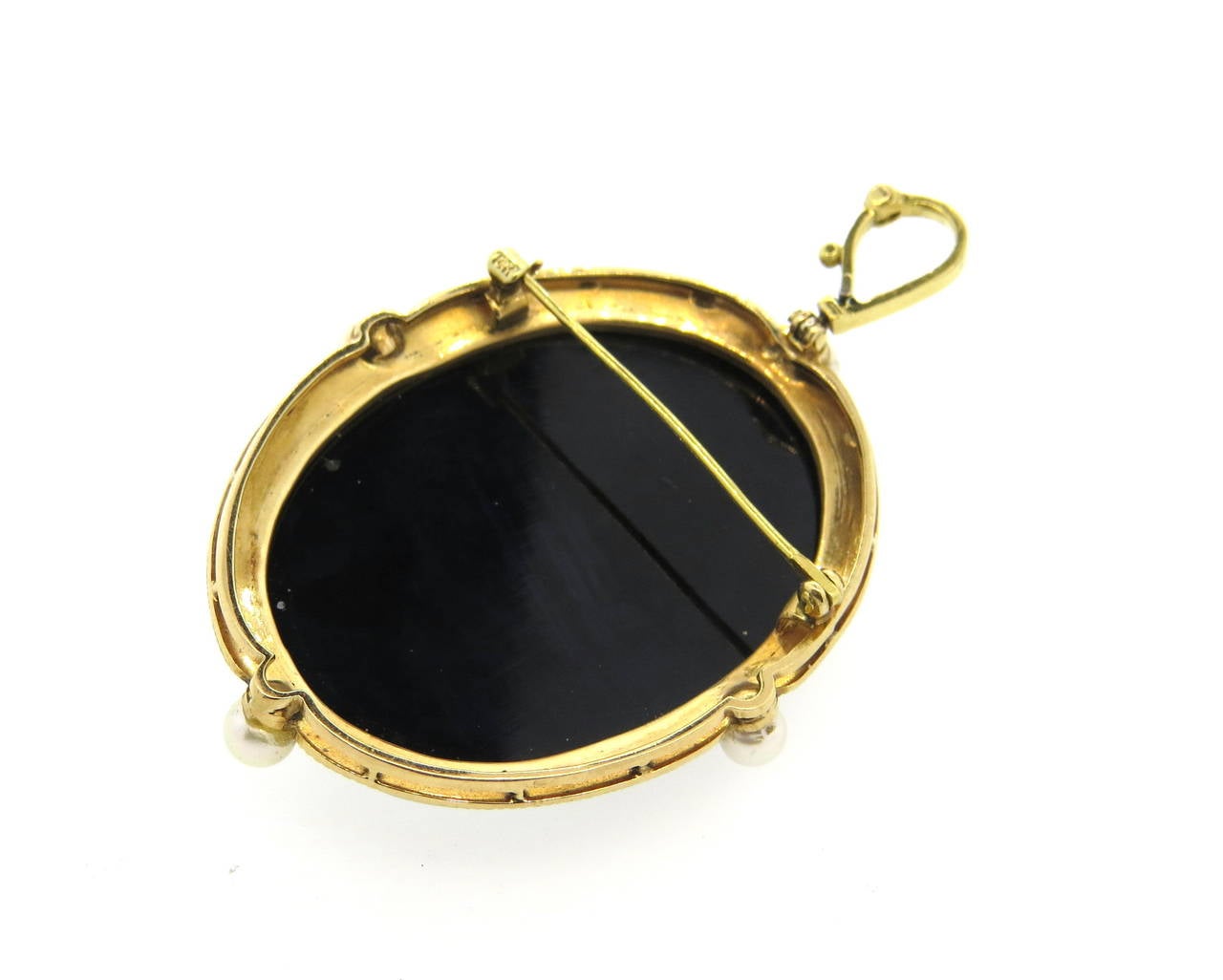 Antique circa 1870s 14k gold brooch, set with hardstone cameo, surrounded with four 4.6mm pearls.  Brooch has a bale, that was added at a later date so piece can also be worn as a pendant; pin stem has also been added later. Brooch measures 54mm x
