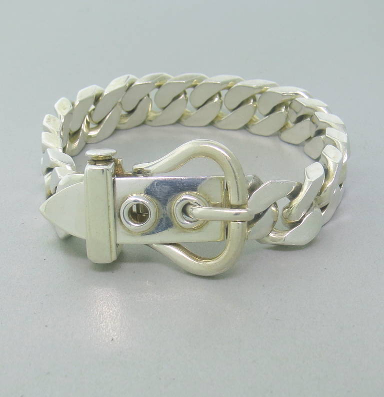 Hermes Sterling Silver Bracelet with a Buckle Motif.  The bracelet measures 9