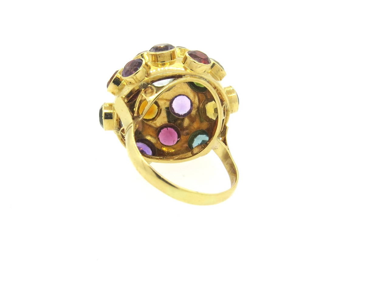 18k gold ring,featuring Sputnik design,  set with multicolor semi precious gemstones - including garnet, citrine, amethyst, tourmaline, peridot, aquamarine. Ring is a size 8 1/2, ring top is  24mm in diameter. Weight of the piece - 6.3 grams