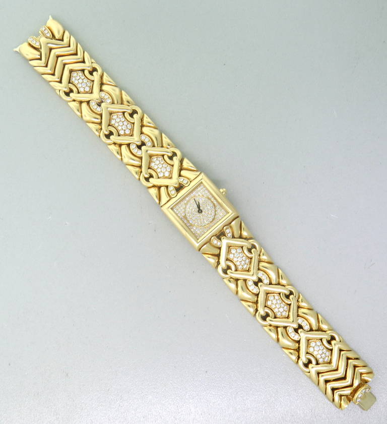 A Bulgari watch made in 18k yellow gold set with 2.45ctw VS/G diamonds. The bracelet is 7.25