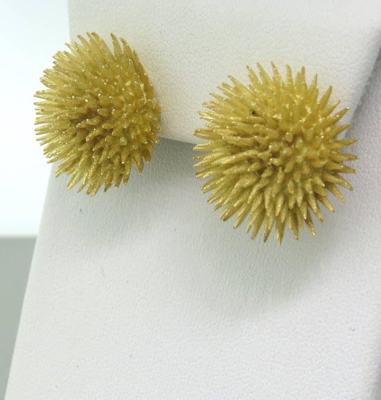 A pair of vintage Tiffany & Co earrings in 18k yellow gold depicting a sea urchin motif.  The earrings are 23mm in diameter and weigh 25.0 grams.