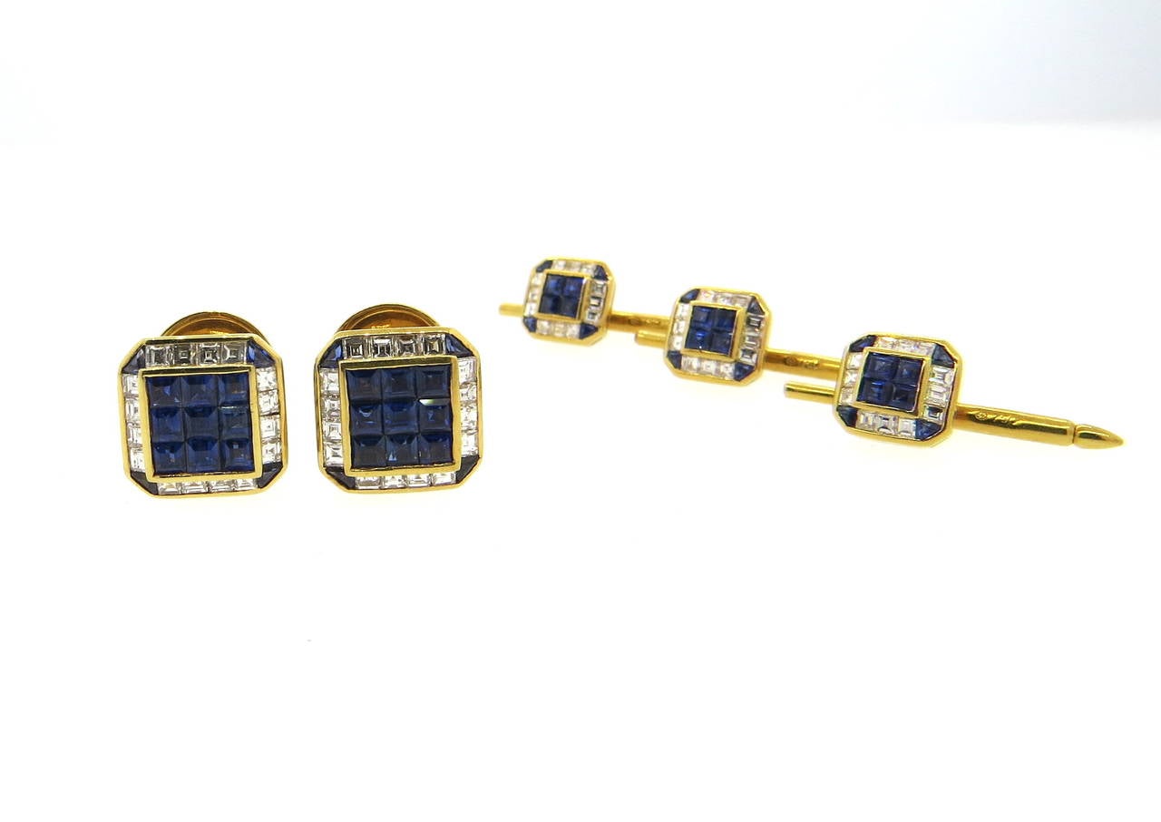 Beautiful 18k gold cufflinks and stud set, set with invisibly set diamonds and blue sapphires. Top of the cufflink measures 13.1mm x 13.2mm, back of the cufflink, decorated with blue sapphire cabochon, measures 11mm in diameter. Top of the stud
