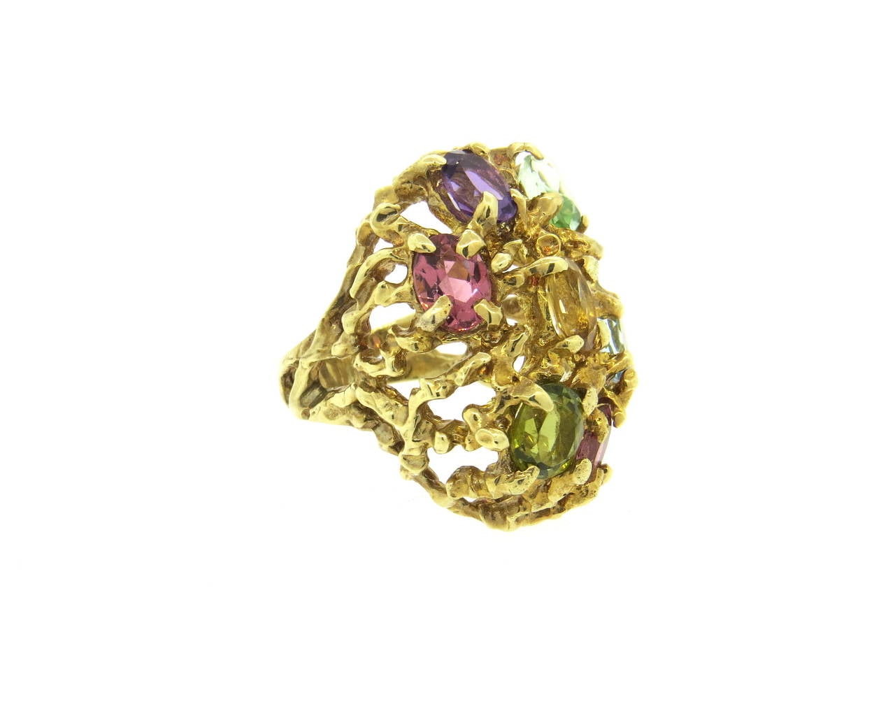 Large 14k gold free form ring, set with multicolor semi precious gemstones, including tourmaline, amethyst, citrine, topaz. Ring is a size  7 1/2, ring top measures 32mm x 25mm, sits approximately 15mm from the top of the finger. Weight of the piece