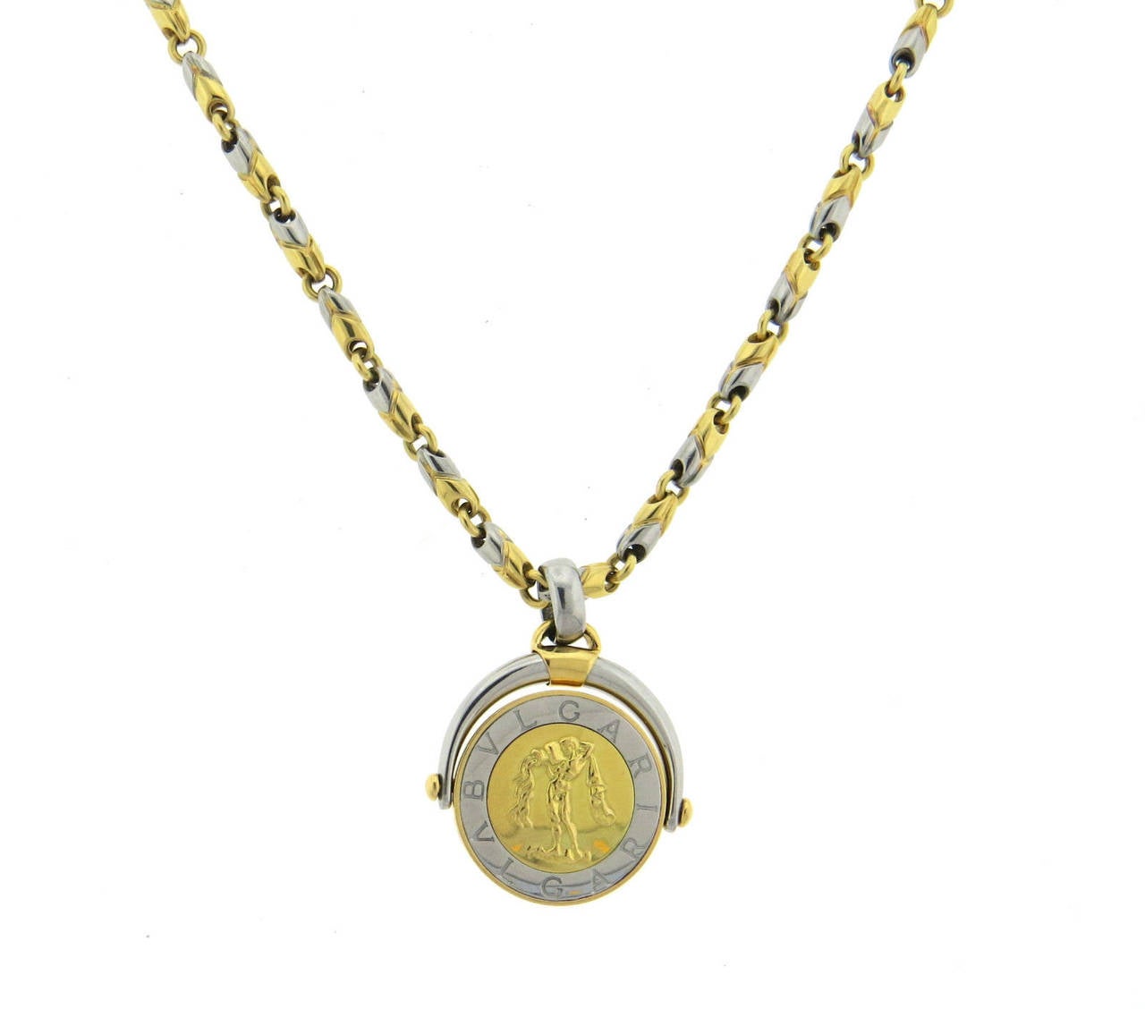Bulgari Steel Gold Aquarius Zodiac Flip Pendant Necklace In Excellent Condition In Lambertville, NJ