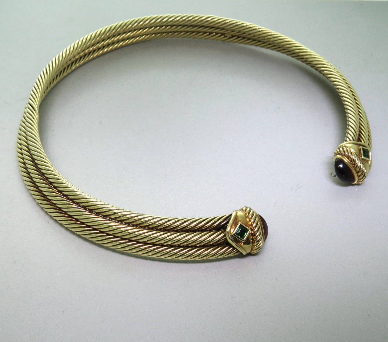 Lovely David Yurman 14K yellow gold collar necklace featuring green tourmaline and garnet in a cable design.