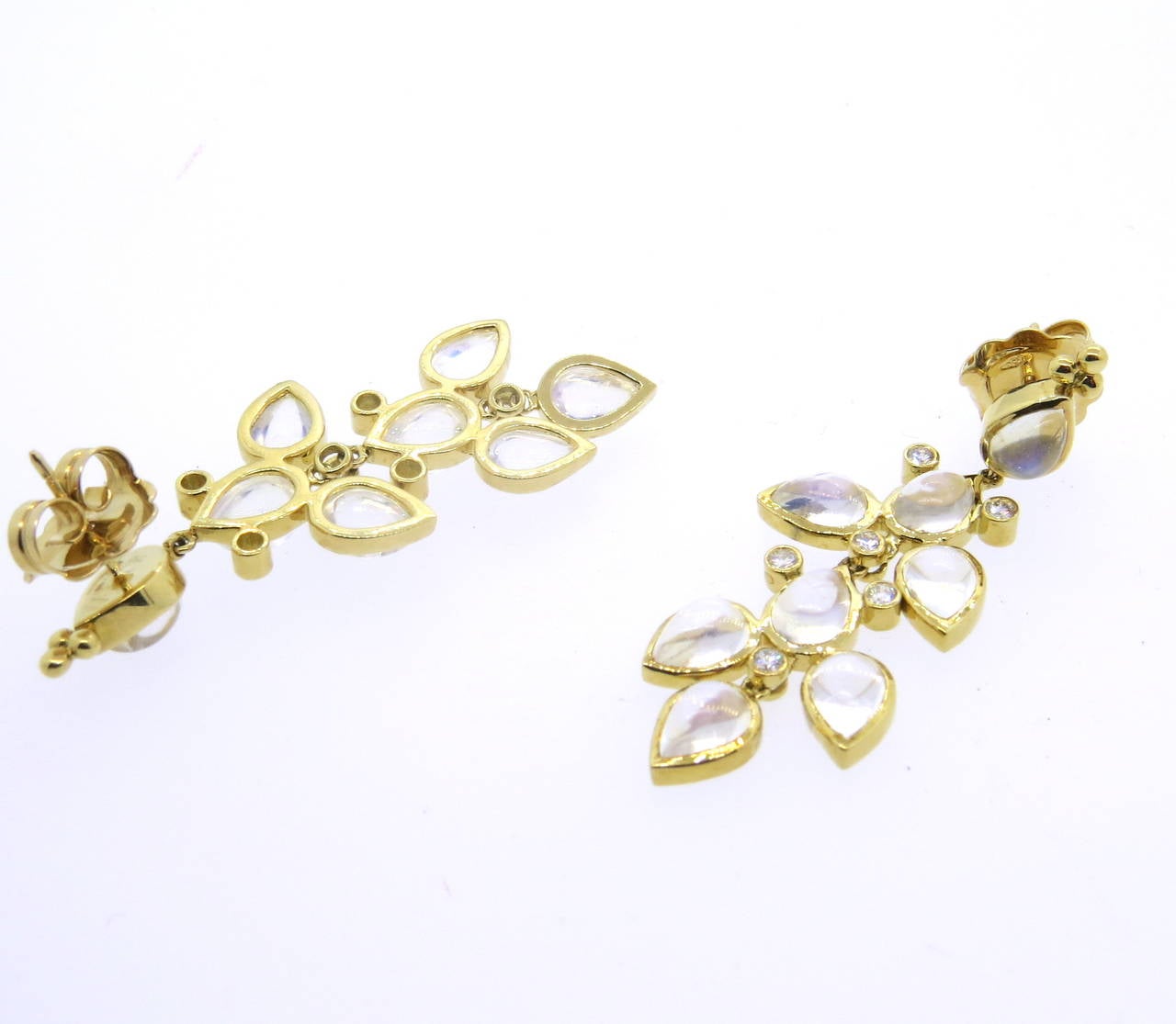 A pair of new Temple St. Clair 18k yellow gold earrings, decorated with 0.40ctw in G/VS diamonds and moonstone cabochons. Earrings measure 50mm x 20mm. marked with Temple hallmark and 750. Weight - 13.4 grams
Retail for $5500