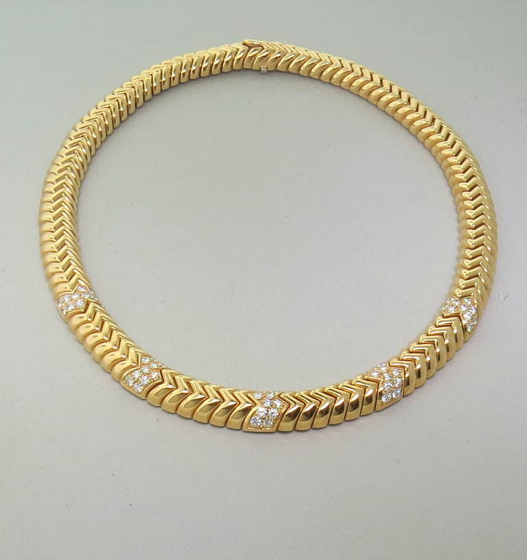 18k gold necklace by Bulgari from iconic Spiga collection,featuring approx. 3.00ctw in diamonds. Necklace is 15 1/2