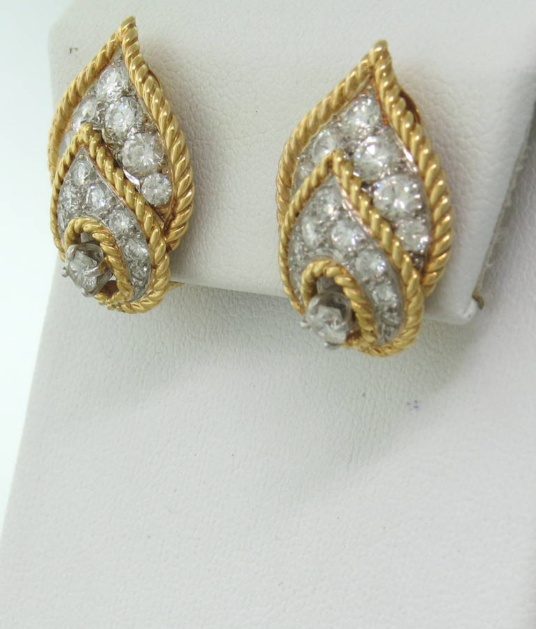 Circa 1960s 18k gold earrings by Van Cleef & Arpels with approx. 2.50ctw in diamonds. Earrings measure 25mm x 18mm. Marked Van Cleef & Arpels,NY,42865. weight - 14.7gr