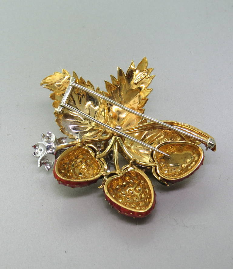 18k yellow and white gold brooch, featuring enamel decorated strawberries, yellow gold leaves and two diamond flowers. Brooch measures 60mm x 65mm. weight of the piece - 48.5gr