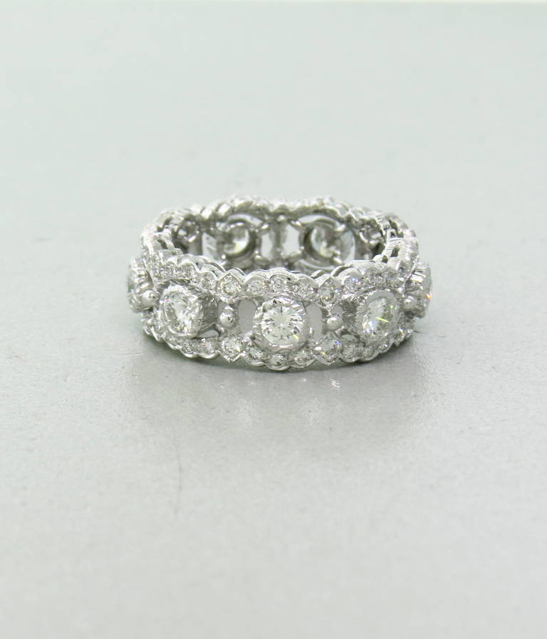 18k white gold wedding band ring by Mario Buccellati with diamonds. Ring size 5 and is 7.3mm wide. Features approx. 2.00ctw of VS G-H Diamonds. Weight - 5.5 grams, comes in original Mario Buccellati box.
