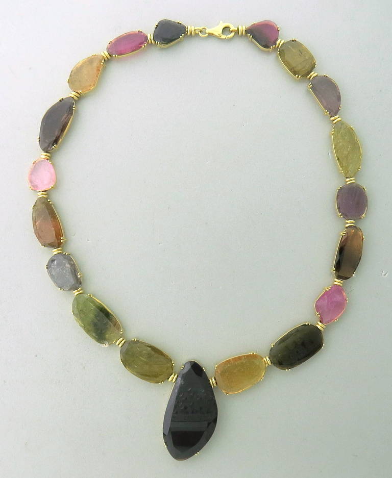 18k gold necklace with multicolor gemstones by Tous. Necklace is 18
