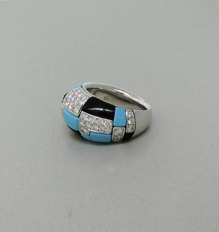 Georland France 18k white gold dome ring featuring approximately 1.42ctw of diamonds, onyx and turquoise. Ring size 6 1/2 and is 13mm wide. Marked Georland, 750. Weight - 19.2gr