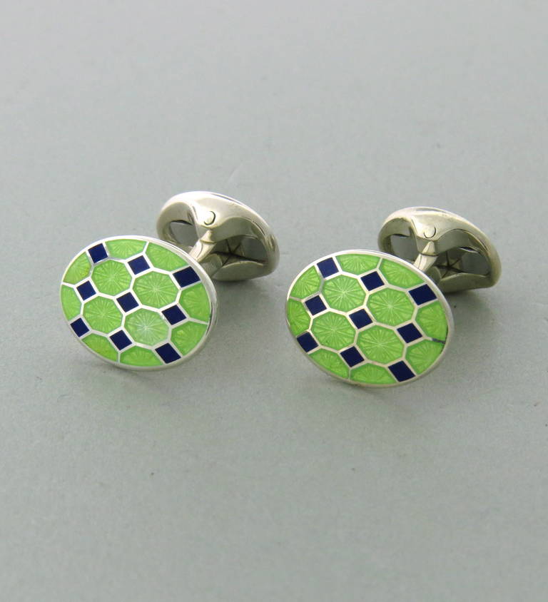 Brand new sterling silver Deakin & Francis lime green and navy blue enamel cufflinks. Cufflink tops measure 19mm x 14mm. Come with original box and papers. Weight - 16.4gr