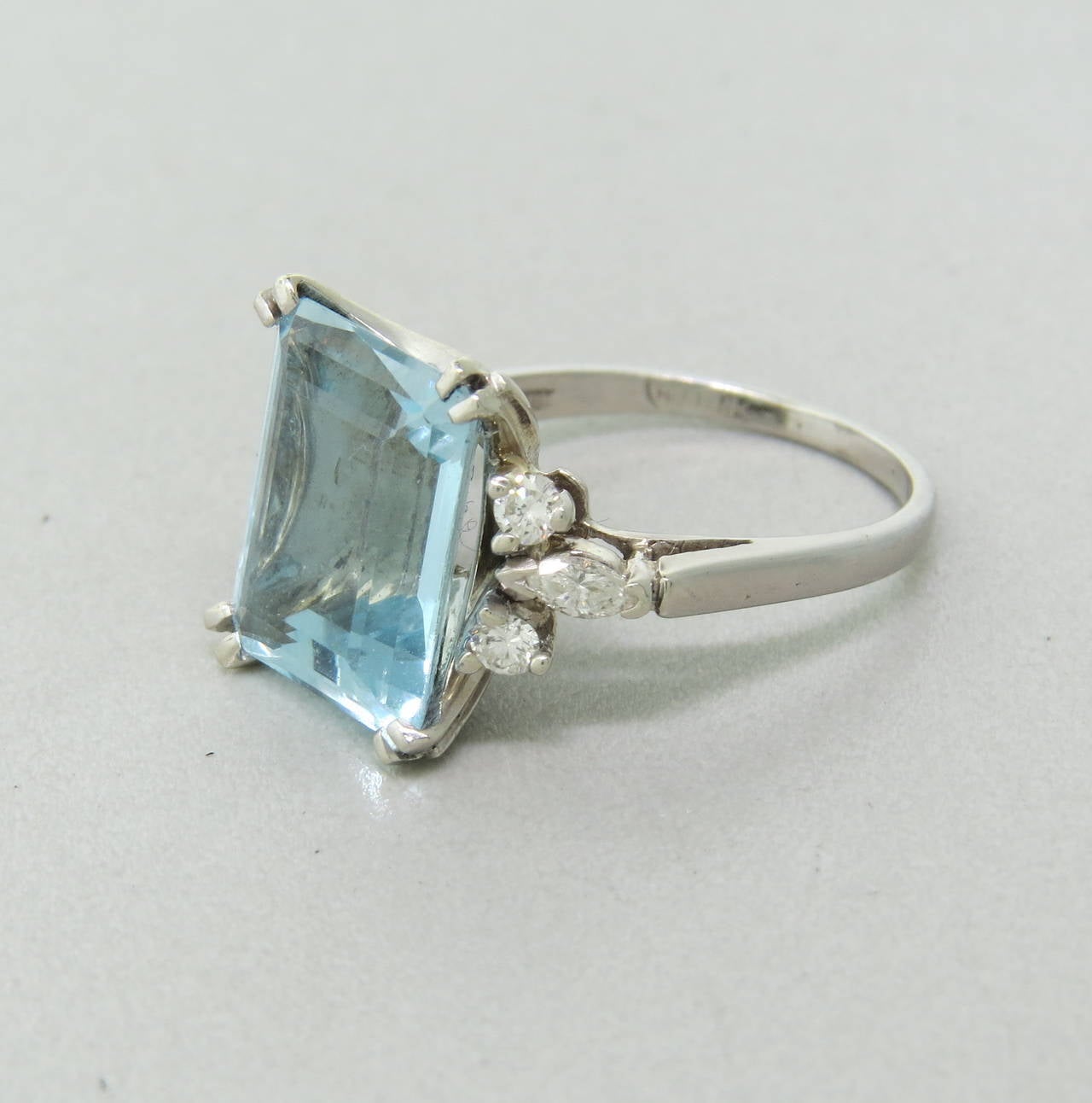 Circa 1950s 14k gold ring with 6.8ct aquamarine and approx. 0.50ctw in diamonds. Ring size 8, ring top is 15mm x 20mm, aquamarine measures  13.9mm x 11.2mm x 6.4mm. weight - 6.7gr