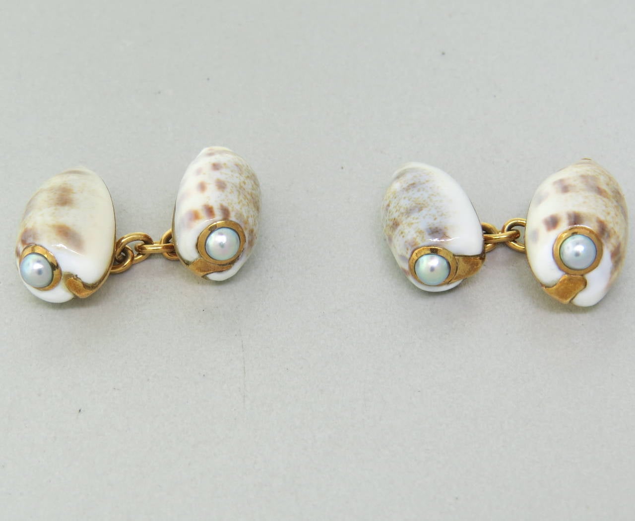 18k gold cufflinks by Trianon, featuring shell top with pearls. Top of the cufflink - 18mm x 11mm.  weight - 10.2gr