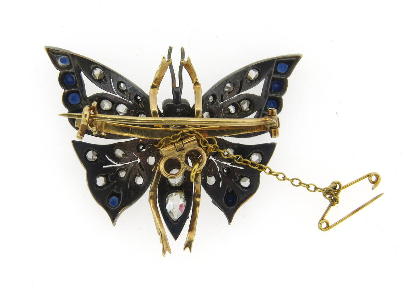 Antique gold and silver top butterfly brooch, featuring rose cut diamonds in the wings and old mine cut diamonds in the body,  sapphires and rubies . Brooch is 36mm x 44mm. Weight - 13gr.