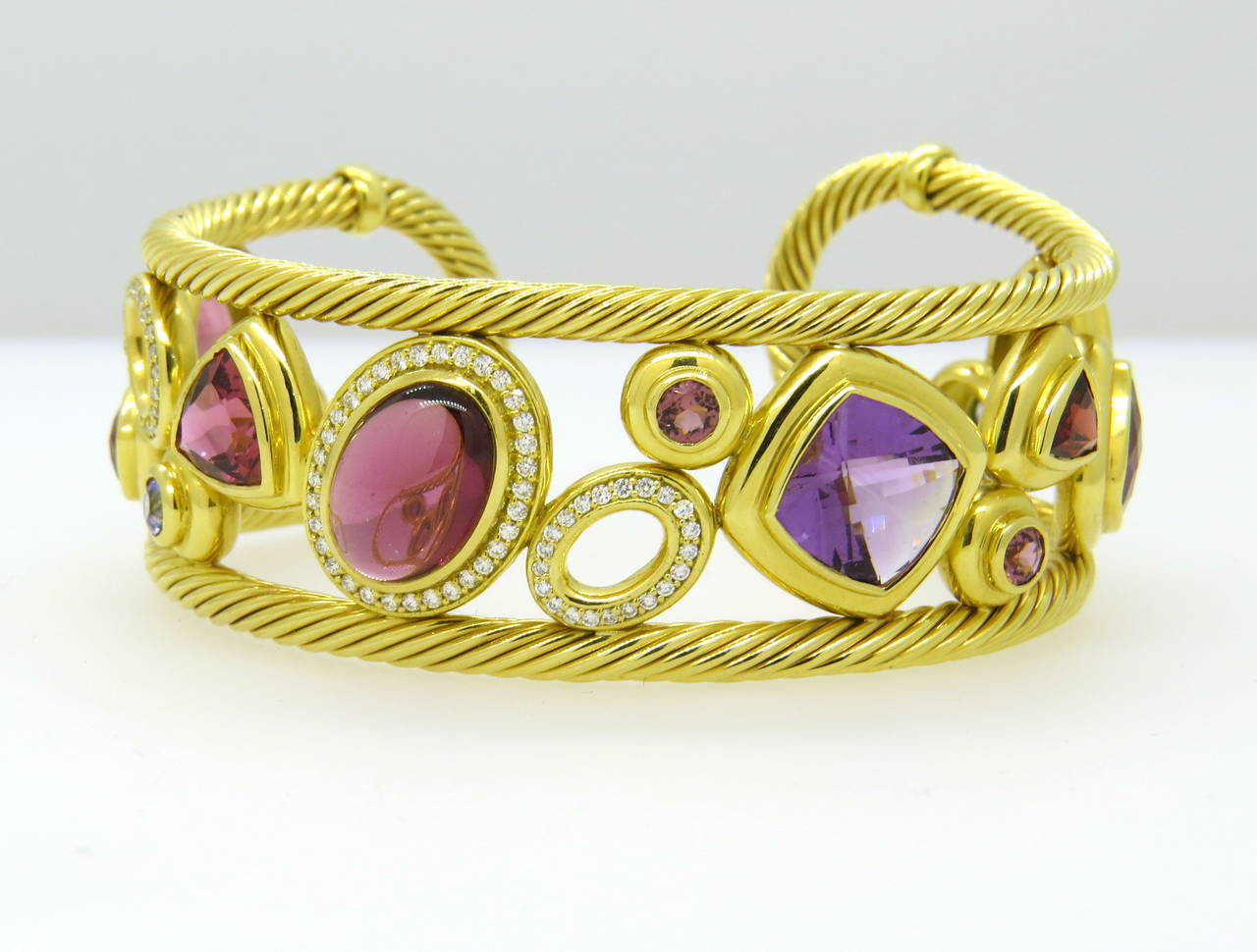 David Yurman 18k gold cuff bracelet from Mosaic collection, featuring diamonds and multicolor gemstones. Cuff will fit up to 7