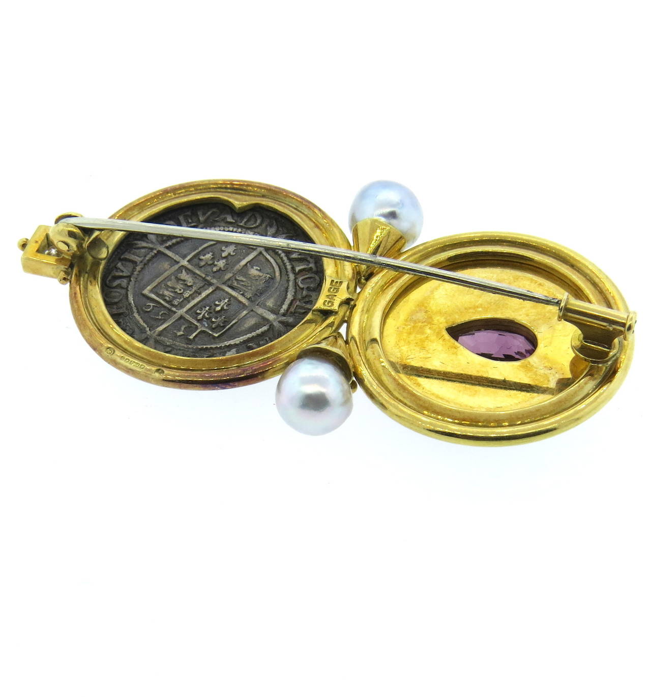 Elizabeth Gage 18k gold brooch pin, with 23mm a coin (Elizabeth 1st 1558-1603 Silver Sixpence (Dated 1569)), pear shape faceted rhodolite garnet, two pearls and diamond.  Brooch is 66mm x 35mm. Marked with English gold marks and Gage. weight of the