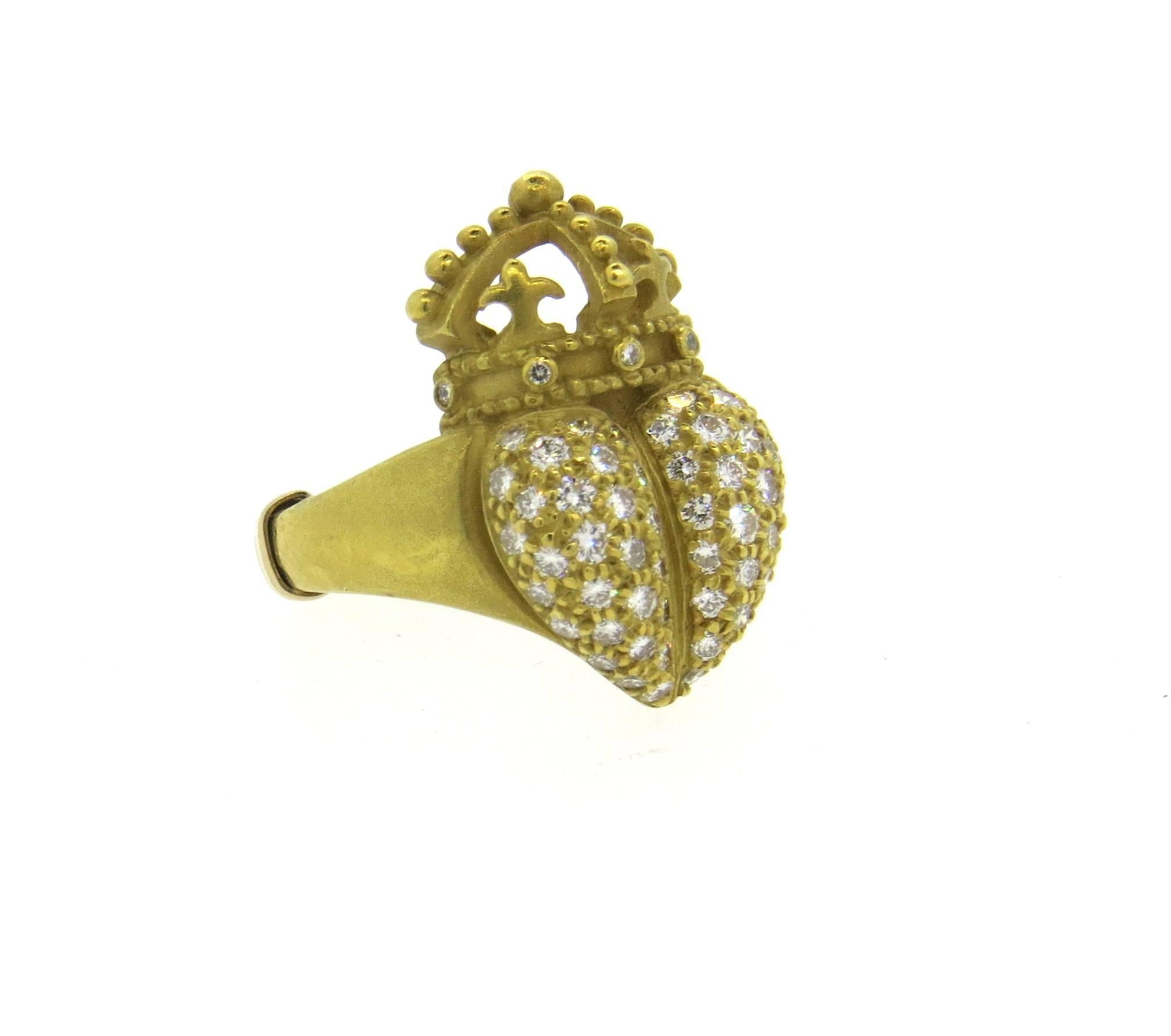 18k yellow gold ring, crafted by Barry Kieselstein Cord for Heart Crown collection, decorated with approx. 0.40ctw in G/VS diamonds. Ring size 5 1/8