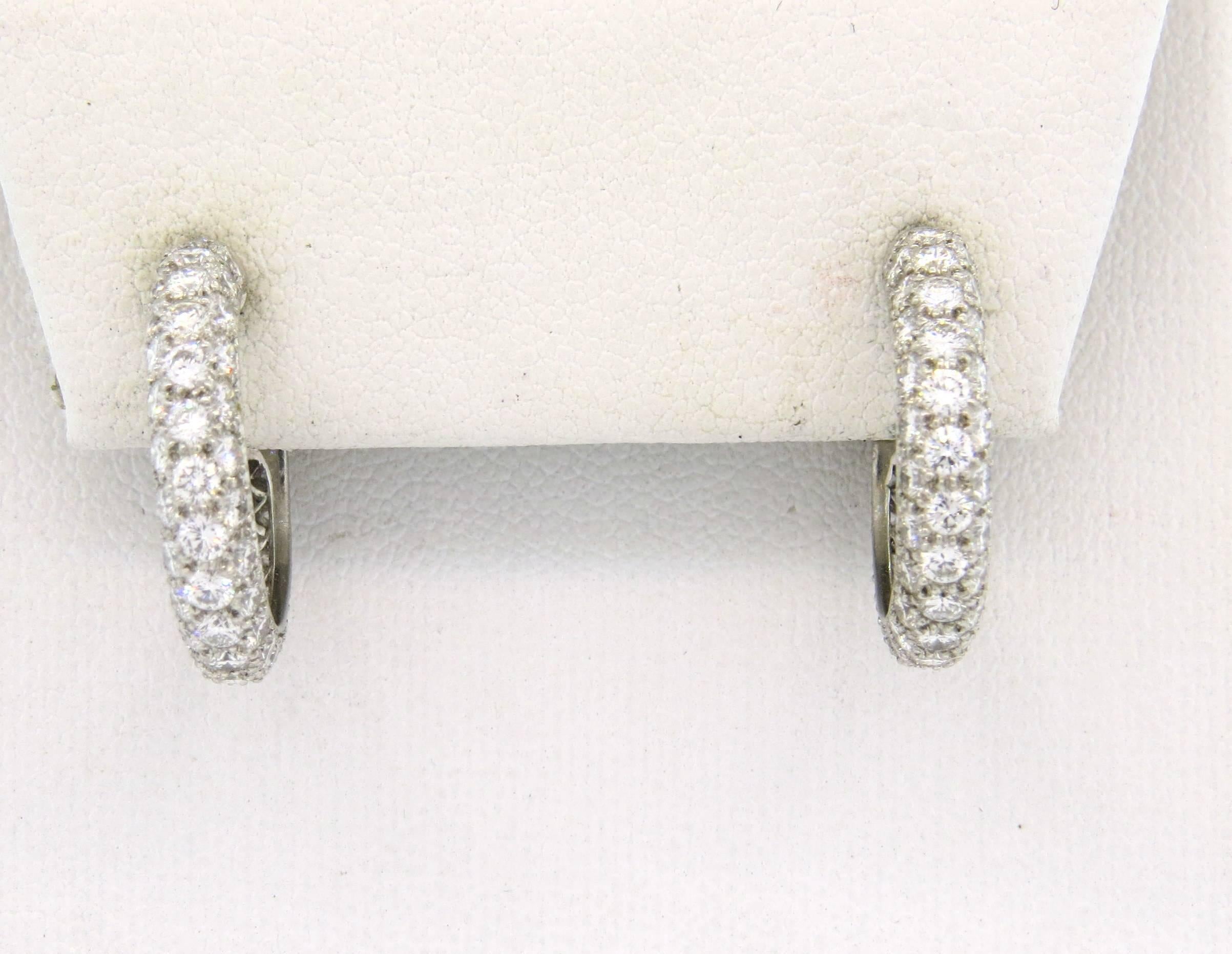 A pair of platinum hoop earrings, crafted by Tiffany & Co for Etoile collection,set with approximately 2.60ctw in G/VS diamonds. Earrings are 20mm in diameter and 4mm wide. Marked: Tiffany & Co, pt950. Weight - 7.9 grams 