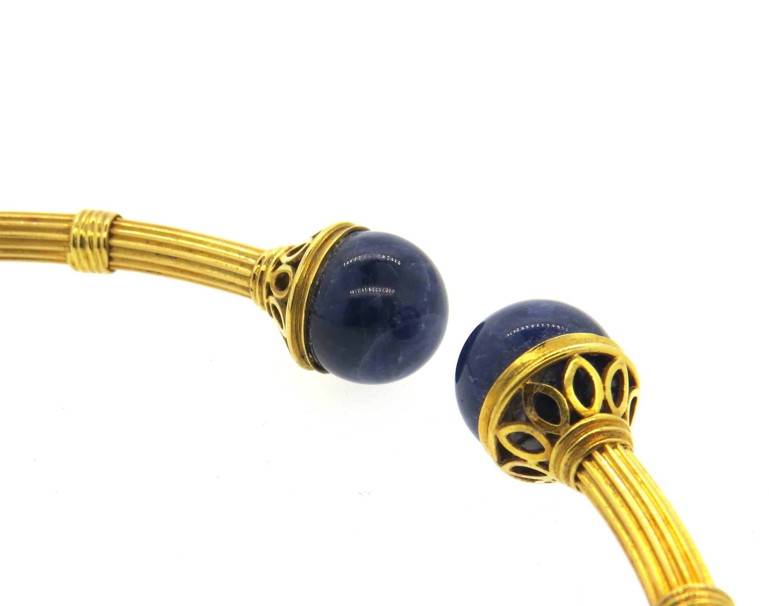 18k yellow gold collar necklace, crafted by Ilias Lalaounis, decorated with two lapis balls  - 14mm in diameter. Necklace's inner circumference is 15