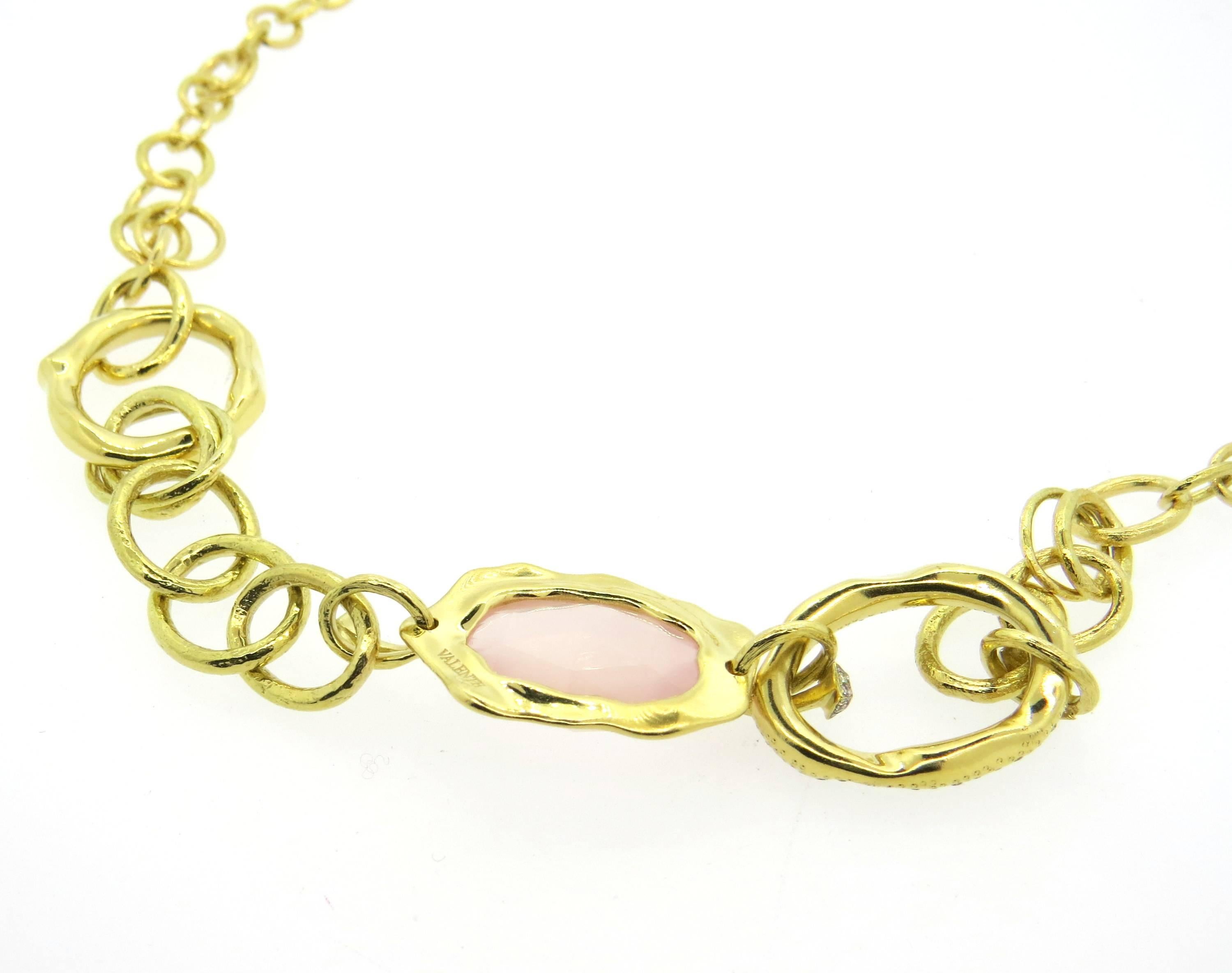 18k yellow gold necklace, crafted by Valente, decorated with diamonds and rose quartz. Necklace is 22