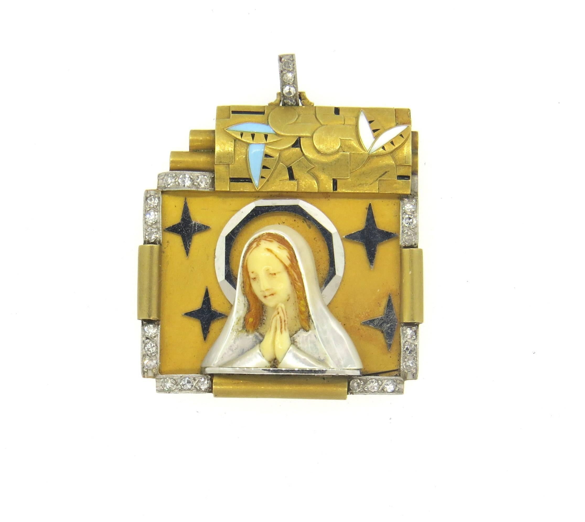 Exquisite Art Deco 18k yellow gold pendant, depicting St. Mary, decorated with diamonds , mother of pearl and enamel . Pendant measures 46mm with bale x 35mm wide. Weight of the piece - 21.9 grams 
